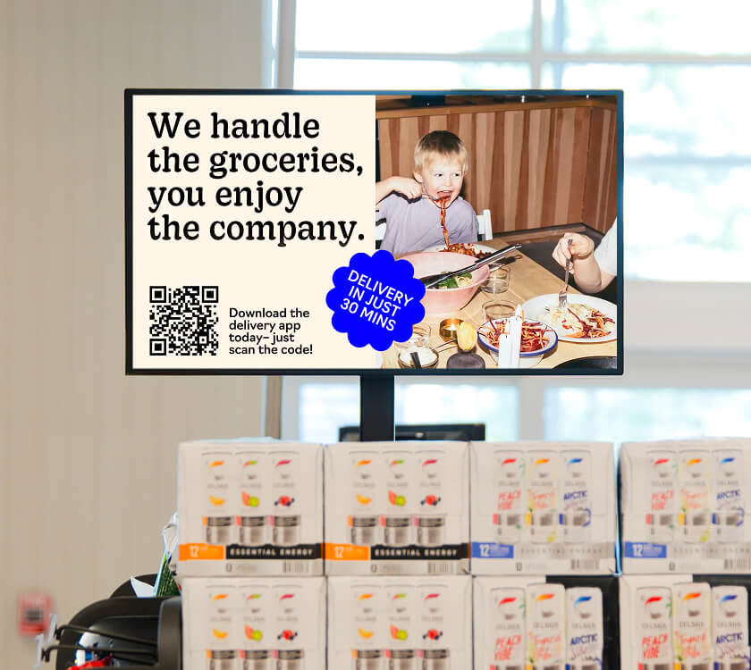 Image of a digital screen showcasing a food delivery platform at the grocery store front end