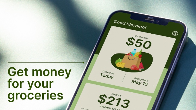 Image of a digital screen showcasing a FinTech brand at the grocery store front end