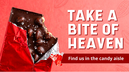 Image of a digital screen showcasing a candy brand at the grocery store front end