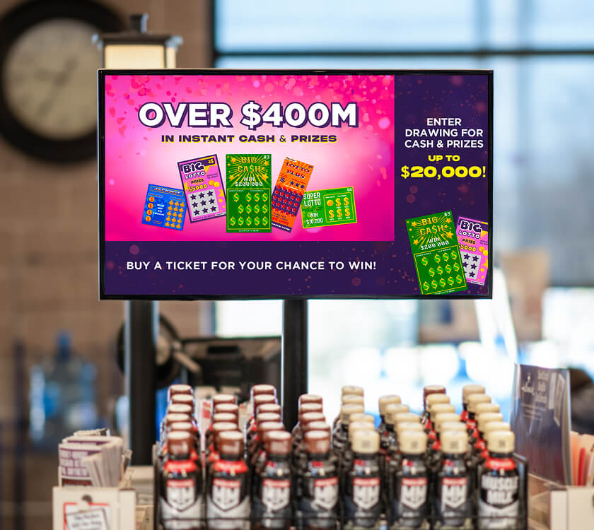 Image of a digital screen showcasing a lottery brand at the grocery store front end