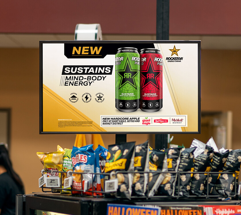 Image of a digital screen showcasing Rockstar at the grocery store front end